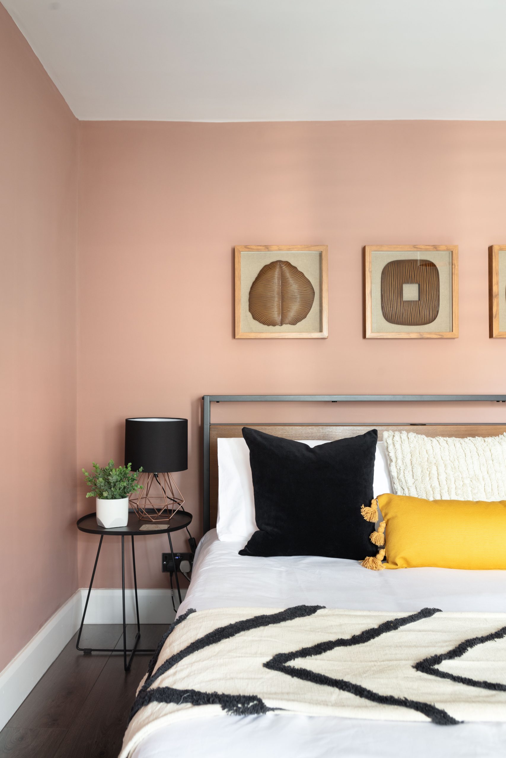pink wall bedroom and bed
