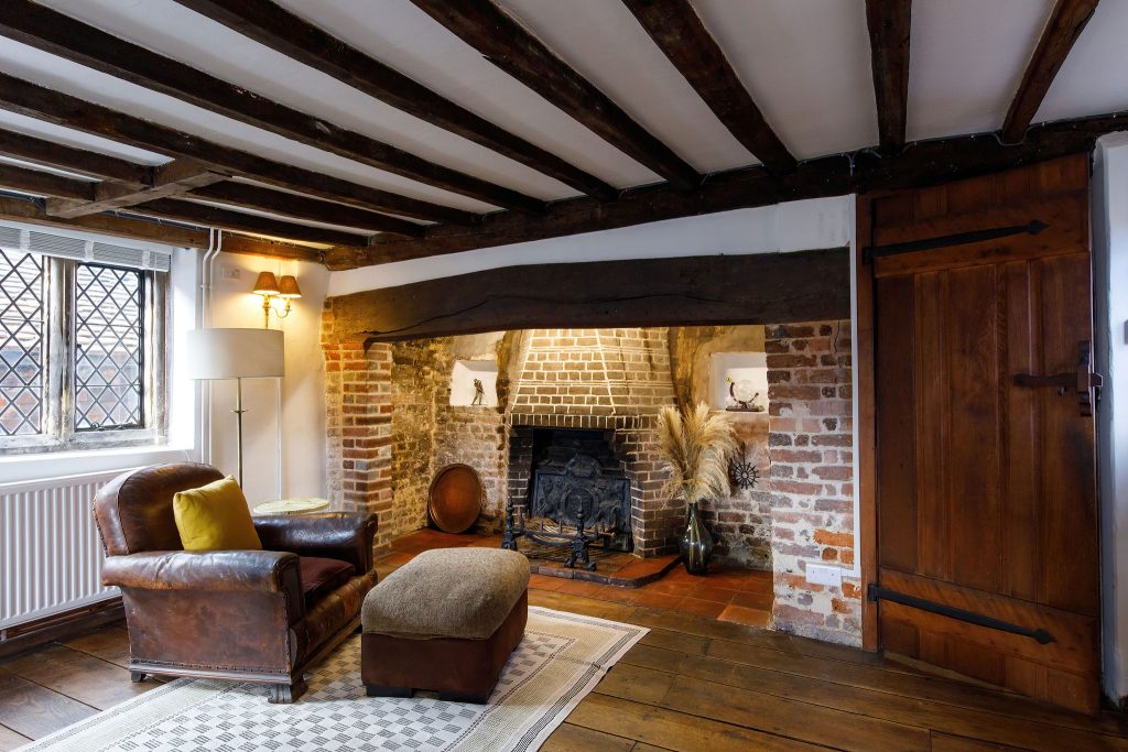 fireplace in lounge in holiday home in sussex 